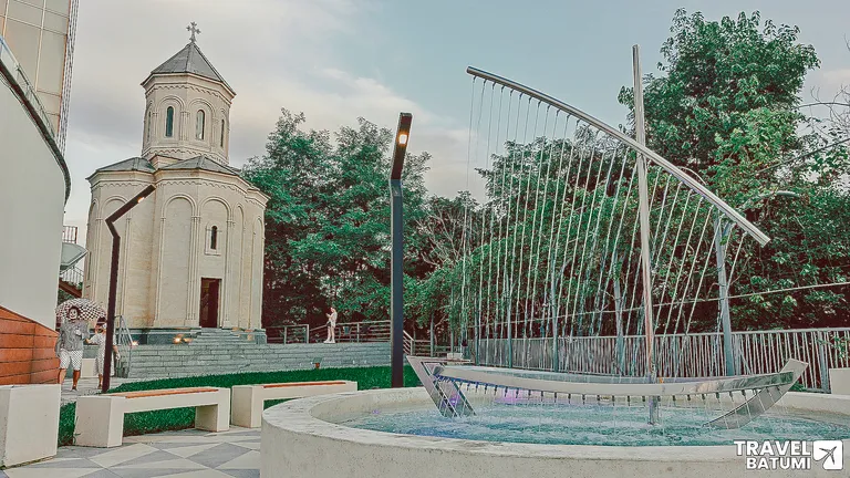 Fountain and St. John the Baptist church at the top station of the Argo cable car